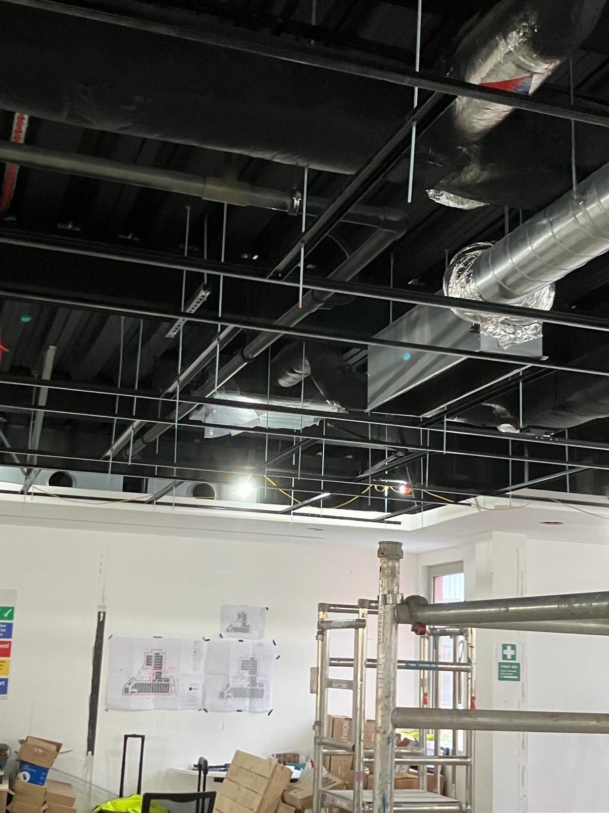 Ceiling void with M&E services and site drawings